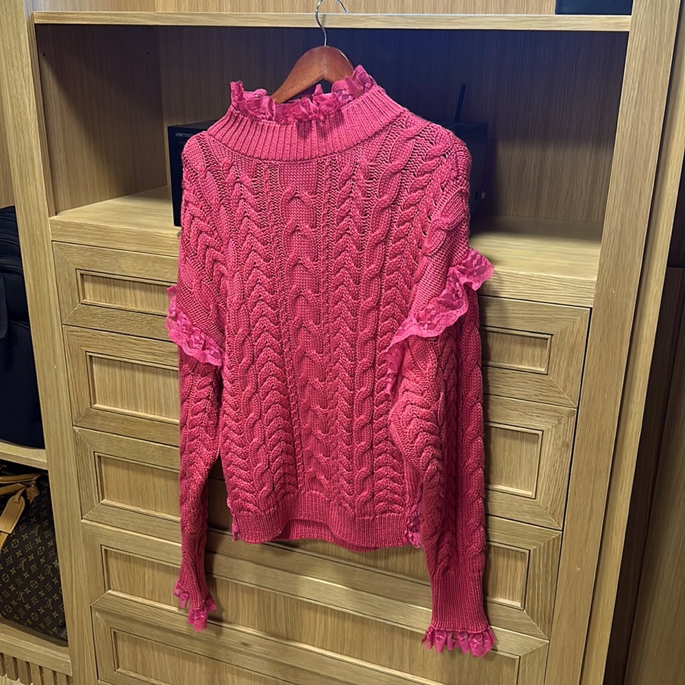 Pink ruffled oversized sweater by paper in London